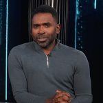 Justin’s gray zip sweater on E! News