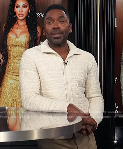 Justin’s white textured cardigan on E! News