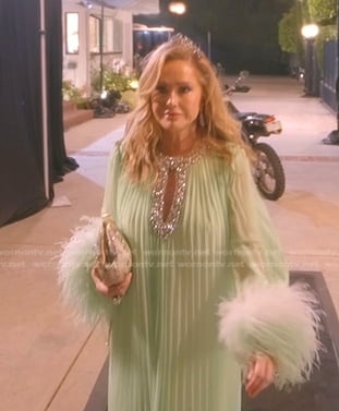 Kathy’s green pleated feather cuff dress on The Real Housewives of Beverly Hills