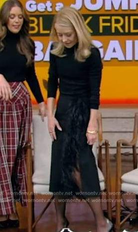 Kelly’s black feather trim skirt on Live with Kelly and Mark