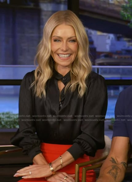 Kelly’s black satin blouse and skirt on Live with Kelly and Mark