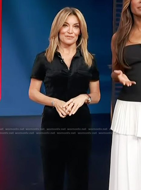 Kit’s black velvet jumpsuit on Access Hollywood