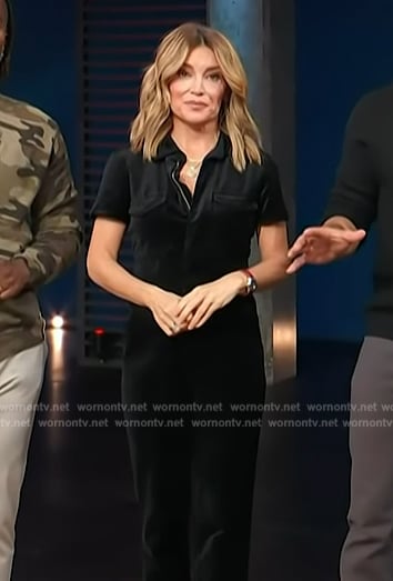 Kit’s black velvet jumpsuit on Access Hollywood