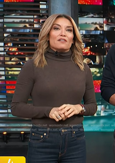Kit’s brown knit turtleneck top on Access Hollywood