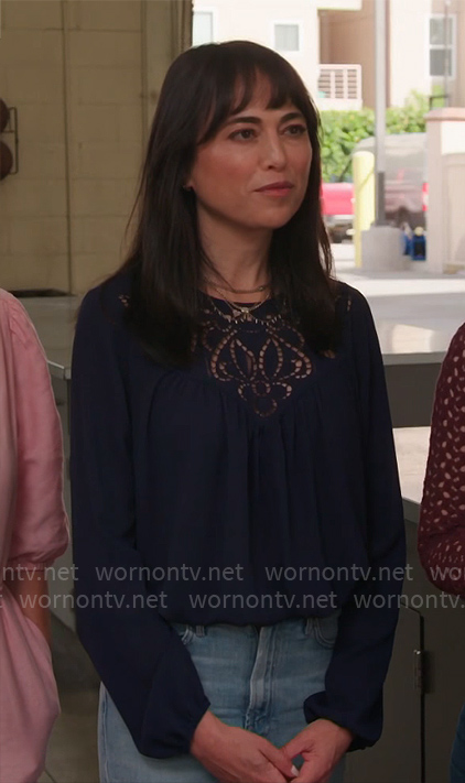 Lisa’s navy blue eyelet top on Celebrations with Lacey Chabert