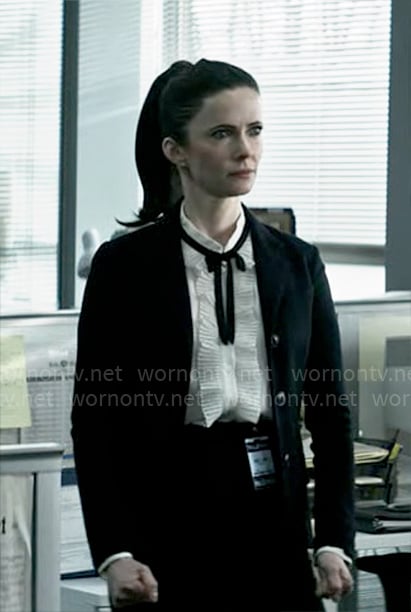 Lois’s white pleated ruffle blouse with tie on Superman and Lois
