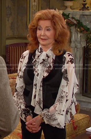Maggie’s white floral ruffled blouse on Days of our Lives