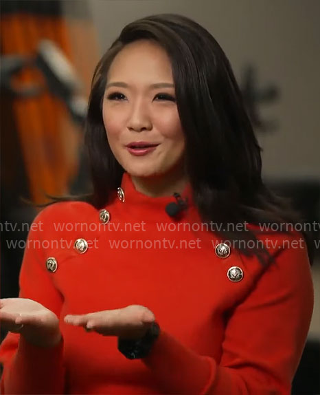 Nancy Chen’s red sweater with gold buttons on CBS Mornings