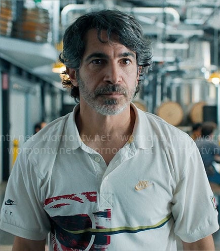 Nathan’s white graphic print Nike polo shirt on Based on a True Story