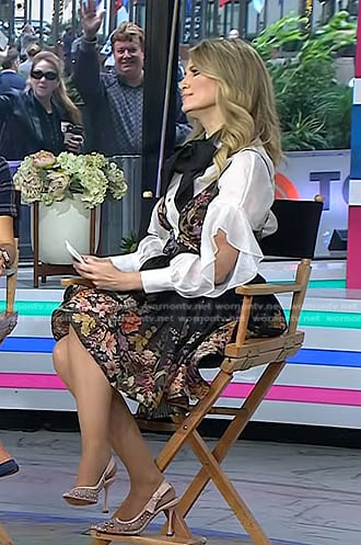 Nikki Novak’s white tie neck blouse and black floral dress on Today