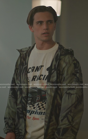 Robby’s racing car print tee and green print jacket on Cobra Kai