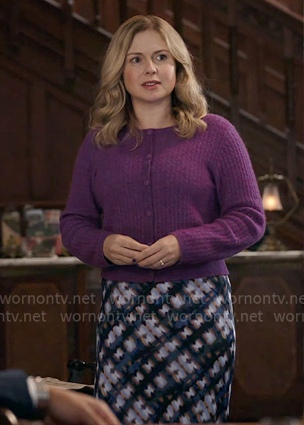 Sam’s purple cable-knit cardigan and printed midi skirt on Ghosts