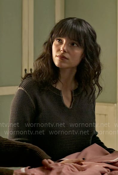 Sarah’s black waffle-knit top on Superman and Lois