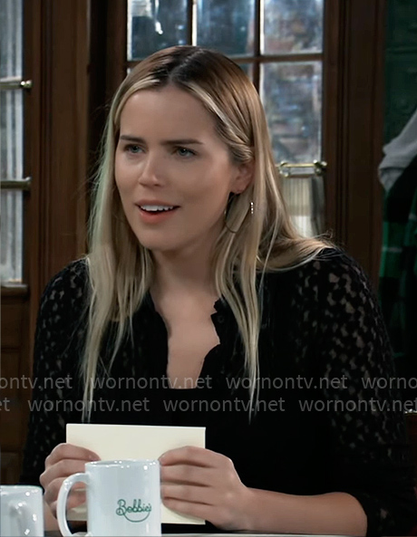Sasha’s black knit shirt on General Hospital