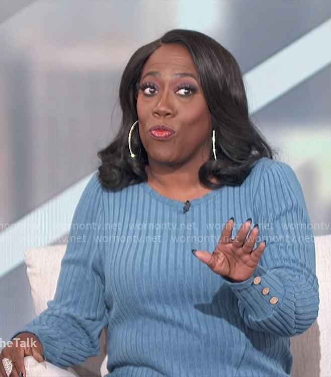 Sheryl’s blue ribbed tulip hem sweater on The Talk