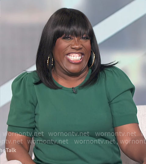 Sheryl’s green puff-sleeve sweater on The Talk