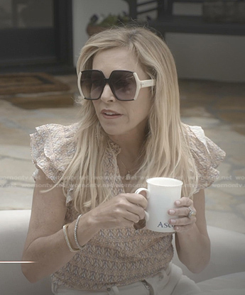 Sutton’s print ruffle top and sunglasses on The Real Housewives of Beverly Hills