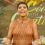 Tamron’s metallic knit top and sequin skirt on Tamron Hall Show
