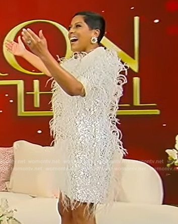 Tamron’s white feather mini dress on Tamron Hall Show