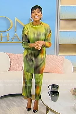 Tamron’s green tie dye mini dress and pants on Tamron Hall Show