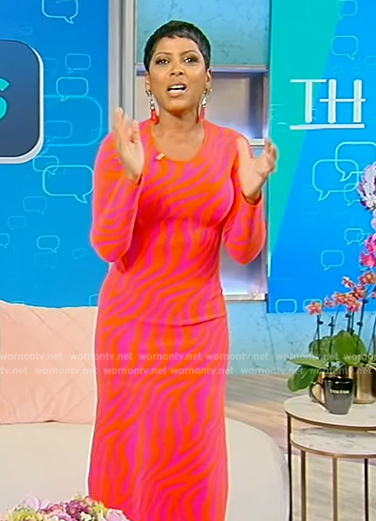 Tamron’s pink red zebra print dress on Tamron Hall Show