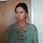 Tory’s green floral embroidered top on Based on a True Story