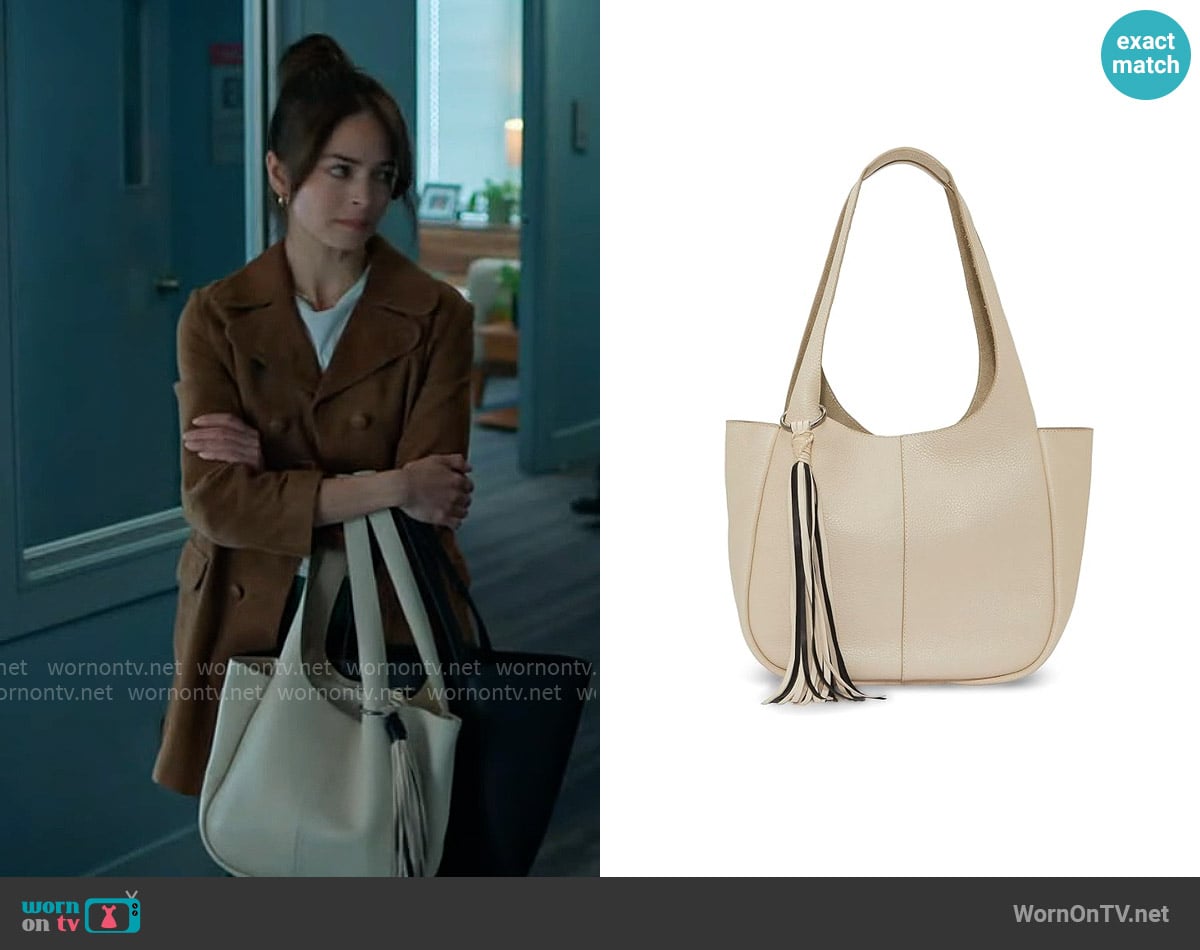 Vince Camuto Maybl Tote in Warm Vanilla worn by Cassandra Lee (Kristin Kreuk) on Murder in a Small Town