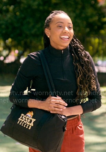 Whitney’s black half-zip top on The Sex Lives of College Girls