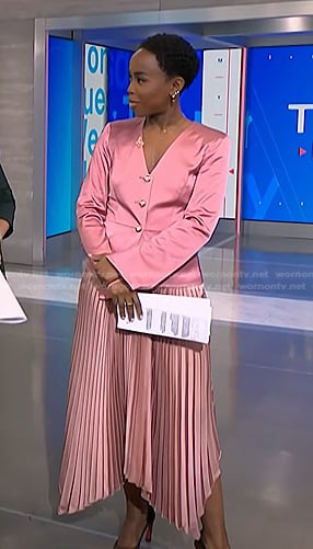 Zinhle’s pink satin jacket and pleated skirt on NBC News Daily