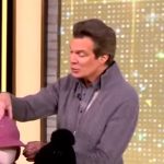 Adam Glassman’s gray cableknit cardigan on The View