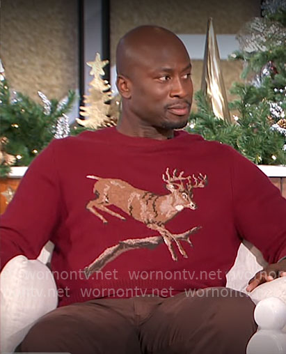 Akbar’s red deer sweater on The Talk