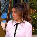 Alyssa’s white ruffle front tie neck blouse on The View