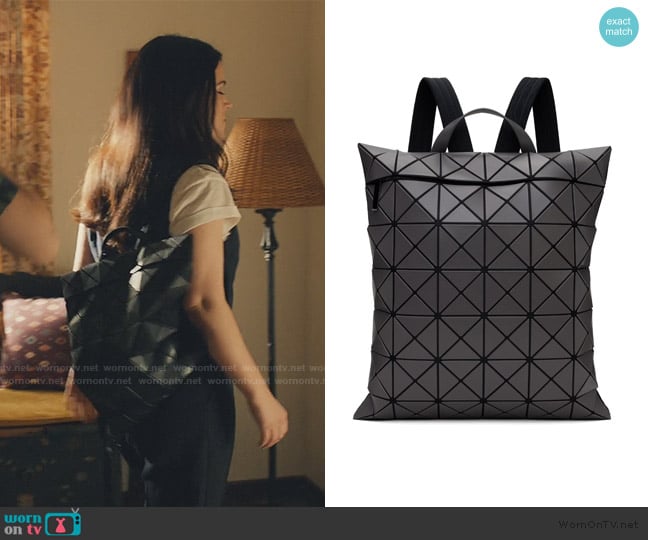 Issey Miyake Bao Bao Gray Flat Pack Backpack worn by Leslie Fisher (Abbi Jacobson) on No Good Deed