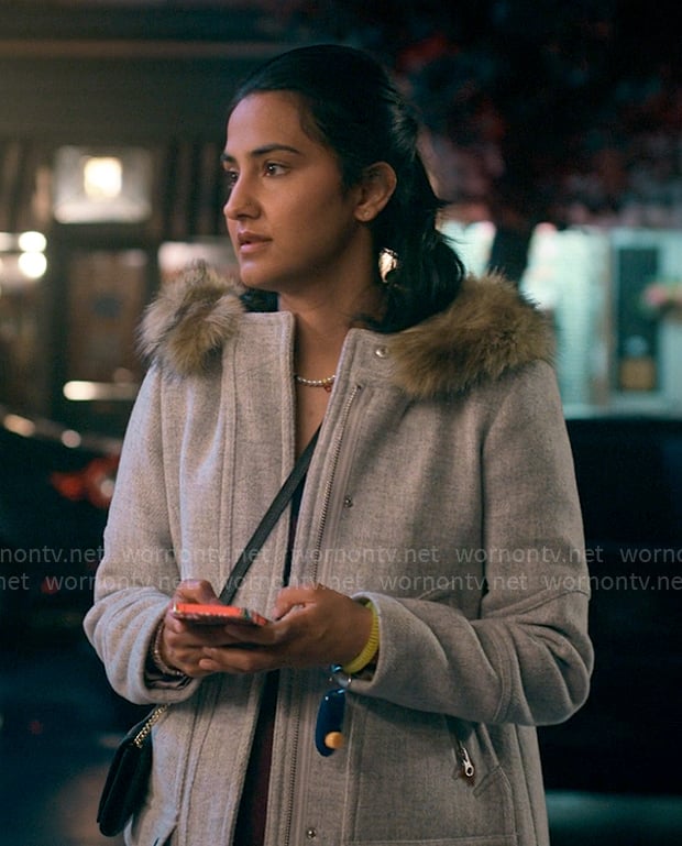 Bela’s grey coat with fur trim hood on The Sex Lives of College Girls