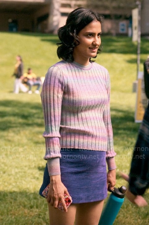 Bela’s pastel ombre sweater and purple corduroy skirt on The Sex Lives of College Girls