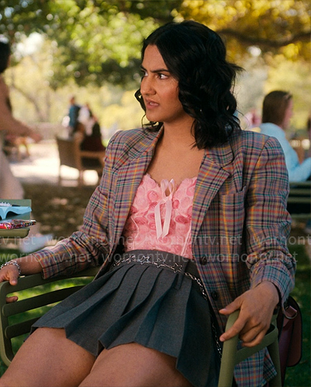 Bela’s plaid blazer and pink floral bustier top on The Sex Lives of College Girls
