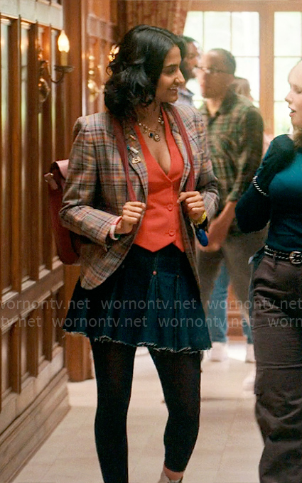 Bela’s plaid blazer and pleated denim skirt on The Sex Lives of College Girls