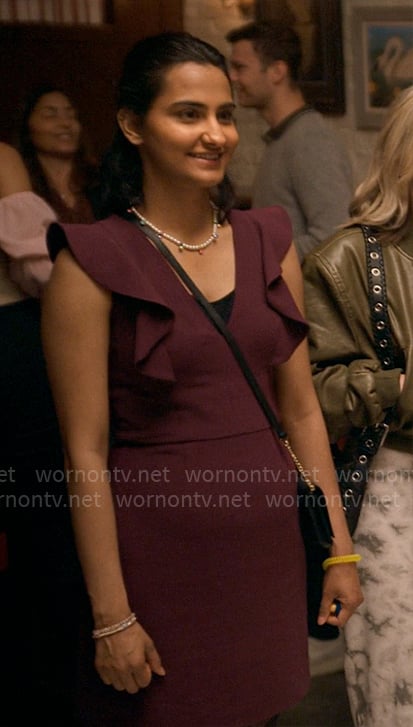 Bela’s purple v-neck dress with ruffles sleeves on The Sex Lives of College Girls