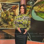 Dana Jacobson’s lime abstract print top on CBS Mornings