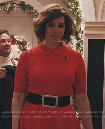 Deedee’s red cableknit top on Elsbeth