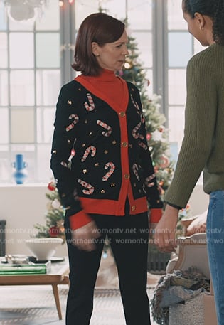 Elsbeth’s black candy cane Christmas cardigan on Elsbeth