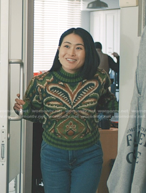 Gia’s green print sweater on Elsbeth