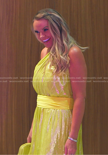 Heather’s metallic yellow one-shoulder dress on The Real Housewives of Salt Lake City