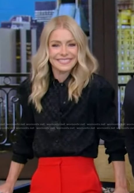 Kelly’s black satin blouse on Live with Kelly and Mark
