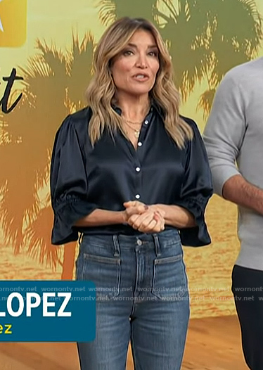 Kit’s black satin top and jeans on Access Hollywood