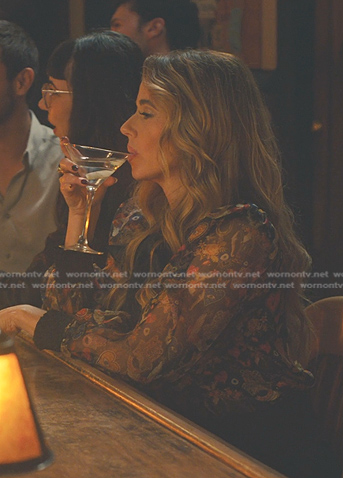 Margo’s black printed tie neck sheer blouse on No Good Deed
