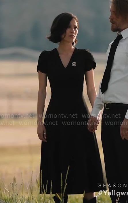 Monica’s black v-neck funeral dress on Yellowstone