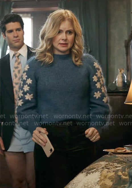 Sam’s blue sweater with floral sleeves on Ghosts
