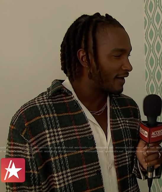Scott’s green plaid jacket on Access Hollywood
