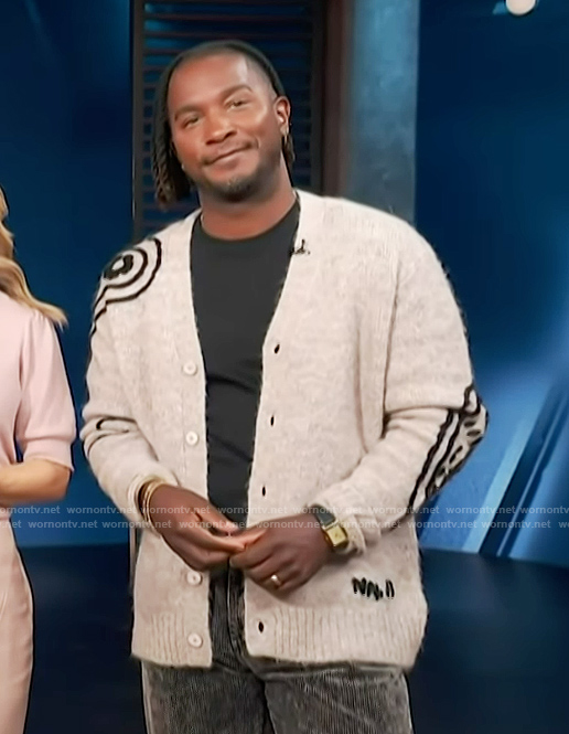 Scott’s paisley cashmere cardigan on Access Hollywood